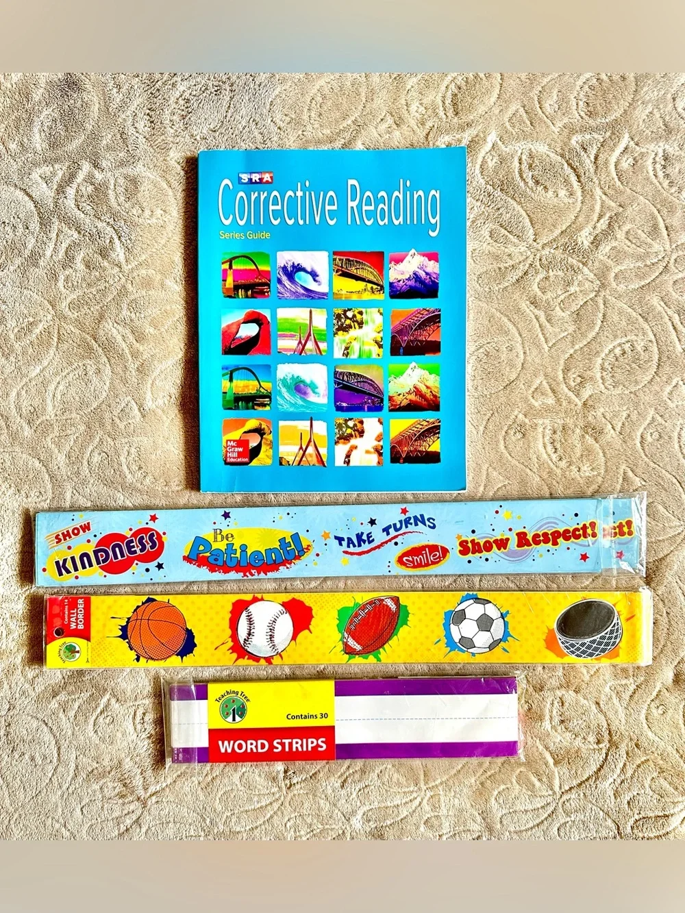 CORRECTIVE READING SERIES GUIDE BOOK BY MC GRAW HILL, WALL BORDER & WORD STRIPS